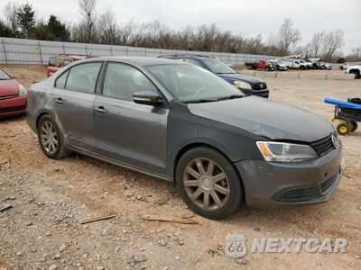 Czwarte zdjęcie samochodu z boku: 2012 VOLKSWAGEN JETTA SE VIN:3VWDX7AJ6CM124477 - miniatura