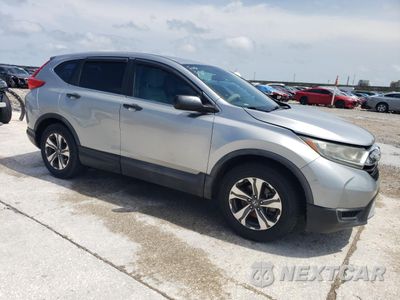Czwarte zdjęcie samochodu z boku: 2017 HONDA CR-V LX VIN:7FARW5H34HE005897 - miniatura