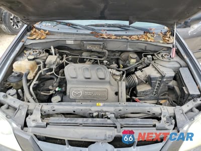 Zdjęcie 12 z 13 samochodu: 2004 MAZDA TRIBUTE LX VIN:4F2YZ041X4KM11363 - miniatura