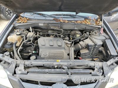 Zdjęcie 12 z 13 samochodu: 2004 MAZDA TRIBUTE LX VIN:4F2YZ041X4KM11363 - miniatura