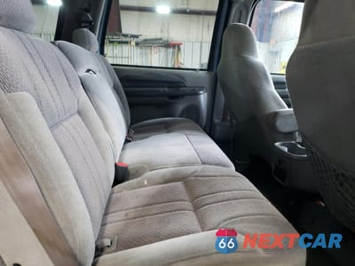 Zdjęcie 11 z 13 samochodu: 2000 FORD EXCURSION XLT VIN:1FMNU41S4YEA53408 - miniatura