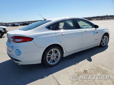 Trzecie zdjęcie samochodu z tyłu: 2018 FORD FUSION SE HYBRID VIN:3FA6P0LU0JR118660 - miniatura