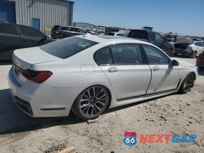 Trzecie zdjęcie samochodu z tyłu: 2021 BMW 740 I VIN:WBA7T2C07MCF88819 - miniatura