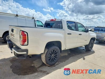 Trzecie zdjęcie samochodu z tyłu: 2021 GMC CANYON ELEVATION VIN:1GTG5BEN6M1140618 - miniatura