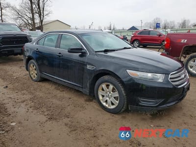 Czwarte zdjęcie samochodu z boku: 2014 FORD TAURUS VIN:1FAHP2H87EG142225 - miniatura