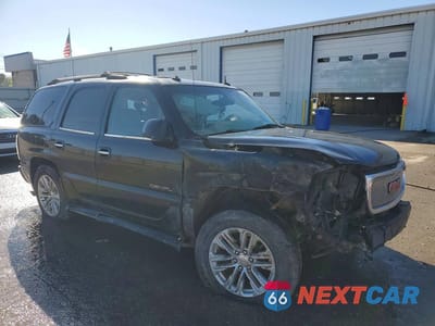 Czwarte zdjęcie samochodu z boku: 2003 GMC YUKON DENALI VIN:1GKEK63U93J289318 - miniatura