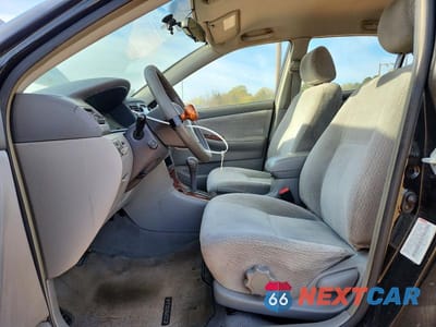 Zdjęcie 7 z 11 samochodu: 2003 TOYOTA COROLLA LE VIN:JTDBR32E830035642 - miniatura