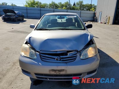 Piąte zdjęcie samochodu w środku: 2003 TOYOTA COROLLA LE VIN:1NXBR32E13Z151303 - miniatura