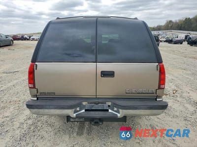 Zdjęcie 6 z 13 samochodu: 1999 CHEVROLET TAHOE C1500 VIN:1GNEC13R6XJ553695 - miniatura
