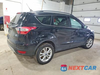 Trzecie zdjęcie samochodu z tyłu: 2018 FORD ESCAPE SEL VIN:1FMCU9HDXJUD29579 - miniatura
