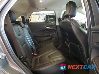 Zdjęcie 10 z 11 samochodu: 2022 FORD EDGE TITANIUM VIN:2FMPK4K95NBA36442 - miniatura