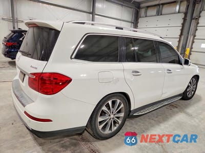 Trzecie zdjęcie samochodu z tyłu: 2014 MERCEDES-BENZ GL 450 4MATIC VIN:4JGDF7CE3EA309877 - miniatura