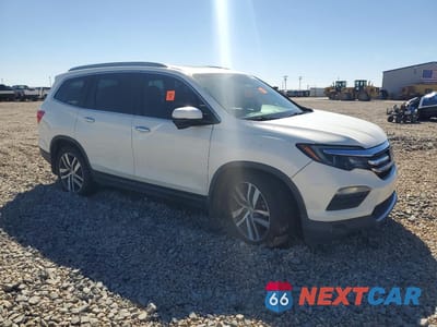 Czwarte zdjęcie samochodu z boku: 2017 HONDA PILOT TOURING VIN:5FNYF6H96HB004705 - miniatura
