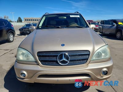 Piąte zdjęcie samochodu w środku: 2002 MERCEDES-BENZ ML 320 VIN:4JGAB54E62A338691 - miniatura