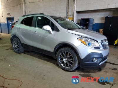 Czwarte zdjęcie samochodu z boku: 2016 BUICK ENCORE SPORT TOURING VIN:KL4CJ2SMXGB730464 - miniatura