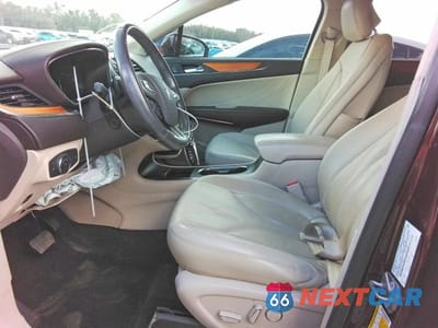 Zdjęcie 7 z 12 samochodu: 2018 LINCOLN MKC SELECT VIN:5LMCJ2C9XJUL30344 - miniatura