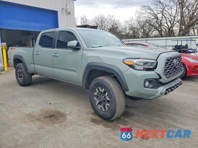 Czwarte zdjęcie samochodu z boku: 2023 TOYOTA TACOMA TRD OFF-ROAD VIN:3TMDZ5BN5PM155664 - miniatura