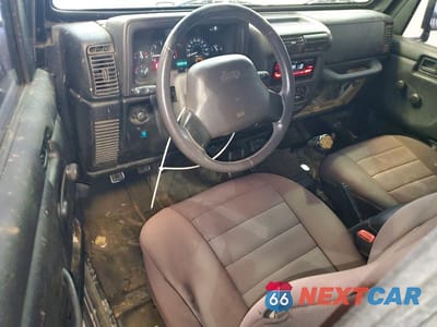 Zdjęcie 8 z 13 samochodu: 2000 JEEP WRANGLER / TJ SAHARA VIN:1J4FA59SXYP782863 - miniatura