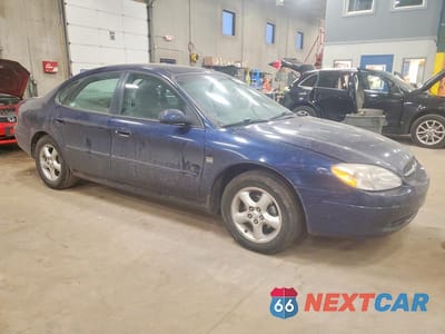 Czwarte zdjęcie samochodu z boku: 2000 FORD TAURUS SES VIN:1FAFP55S9YA104611 - miniatura