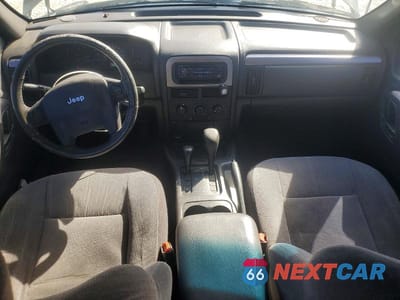 Zdjęcie 8 z 13 samochodu: 2001 JEEP GRAND CHEROKEE LAREDO VIN:1J4GW48N81C543756 - miniatura