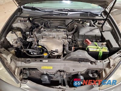 Zdjęcie 11 z 12 samochodu: 2004 TOYOTA CAMRY LE VIN:4T1BE32K64U909655 - miniatura