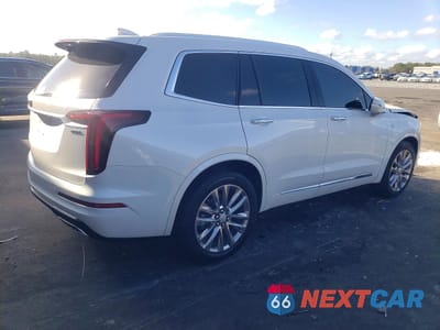 Trzecie zdjęcie samochodu z tyłu: 2022 CADILLAC XT6 PREMIUM LUXURY VIN:1GYKPCRS2NZ132524 - miniatura