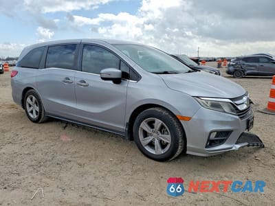 Czwarte zdjęcie samochodu z boku: 2018 HONDA ODYSSEY EXL VIN:5FNRL6H77JB093475 - miniatura