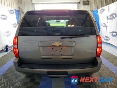 Zdjęcie 6 z 13 samochodu: 2009 CHEVROLET TAHOE POLICE VIN:1GNEC03059R262945 - miniatura