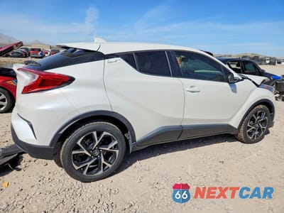 Trzecie zdjęcie samochodu z tyłu: 2019 TOYOTA C-HR XLE VIN:JTNKHMBX2K1022898 - miniatura
