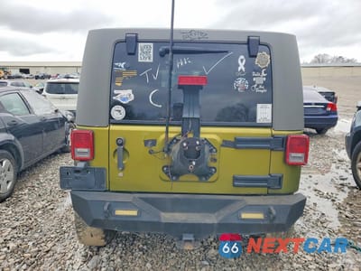 Zdjęcie 6 z 13 samochodu: 2010 JEEP WRANGLER UNLIMITED SAHARA VIN:1J4BA5H19AL203012 - miniatura