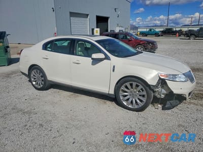 Czwarte zdjęcie samochodu z boku: 2009 LINCOLN MKS VIN:1LNHM93R59G622907 - miniatura