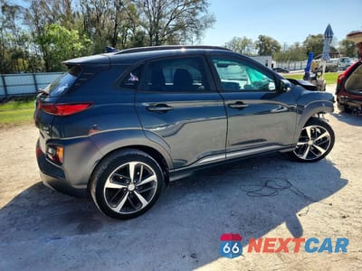 Trzecie zdjęcie samochodu z tyłu: 2019 HYUNDAI KONA LIMITED VIN:KM8K3CA59KU235306 - miniatura