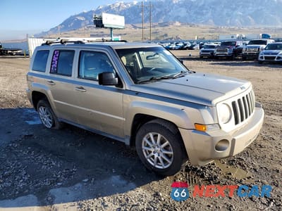 Czwarte zdjęcie samochodu z boku: 2010 JEEP PATRIOT SPORT VIN:1J4NF2GB0AD500848 - miniatura