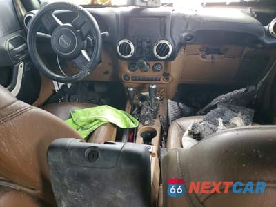 Zdjęcie 8 z 11 samochodu: 2013 JEEP WRANGLER UNLIMITED SAHARA VIN:1C4BJWEG5DL554329 - miniatura