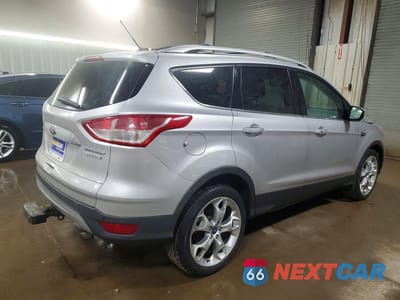 Trzecie zdjęcie samochodu z tyłu: 2014 FORD ESCAPE TITANIUM VIN:1FMCU0J90EUC91805 - miniatura