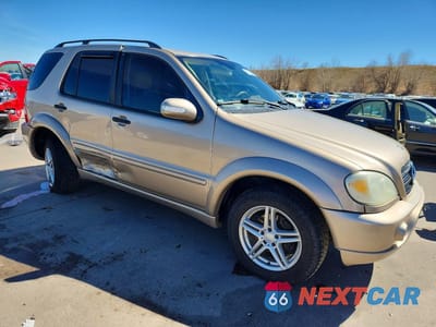 Czwarte zdjęcie samochodu z boku: 2002 MERCEDES-BENZ ML 320 VIN:4JGAB54E62A338691 - miniatura