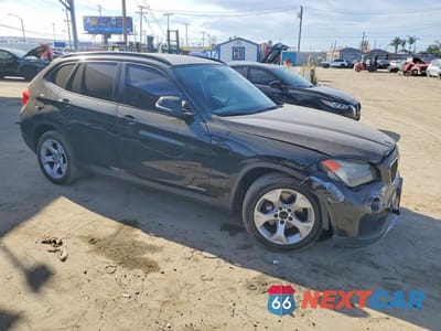 Czwarte zdjęcie samochodu z boku: 2014 BMW X1 SDRIVE28I VIN:WBAVM1C59EVW56471 - miniatura
