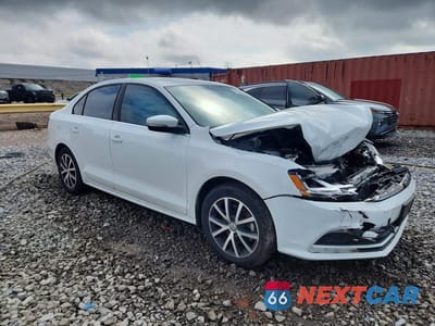 Czwarte zdjęcie samochodu z boku: 2017 VOLKSWAGEN JETTA SE VIN:3VWDB7AJ5HM385394 - miniatura