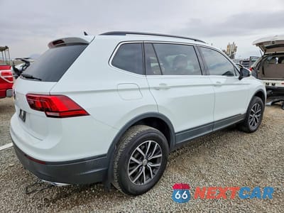 Trzecie zdjęcie samochodu z tyłu: 2019 VOLKSWAGEN TIGUAN SE VIN:3VV3B7AX1KM169960 - miniatura