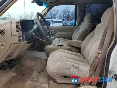 Zdjęcie 7 z 13 samochodu: 1999 GMC YUKON VIN:1GKEC13R9XJ755573 - miniatura