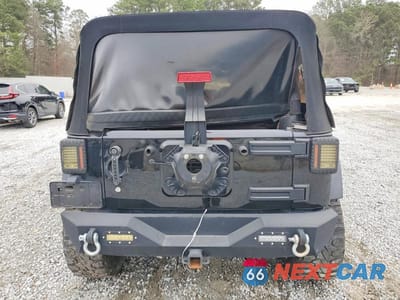 Zdjęcie 6 z 12 samochodu: 2014 JEEP WRANGLER UNLIMITED SAHARA VIN:1C4BJWEG5EL140629 - miniatura