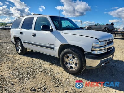 Czwarte zdjęcie samochodu z boku: 2000 CHEVROLET TAHOE K1500 VIN:1GNEK13T2YJ196967 - miniatura