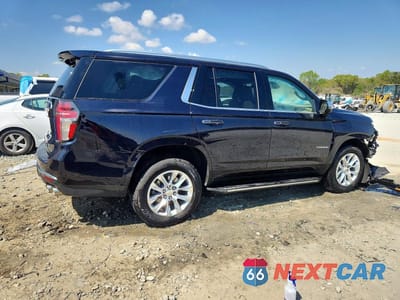 Trzecie zdjęcie samochodu z tyłu: 2023 CHEVROLET TAHOE C1500 PREMIER VIN:1GNSCSKD4PR343886 - miniatura