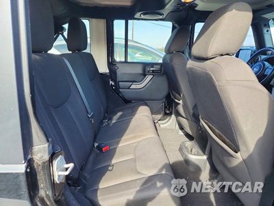 Zdjęcie 10 z 12 samochodu: 2014 JEEP WRANGLER UNLIMITED SPORT VIN:1C4BJWDG4EL270208 - miniatura