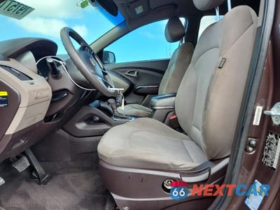 Zdjęcie 7 z 13 samochodu: 2014 HYUNDAI TUCSON GLS VIN:KM8JT3AF9EU925906 - miniatura