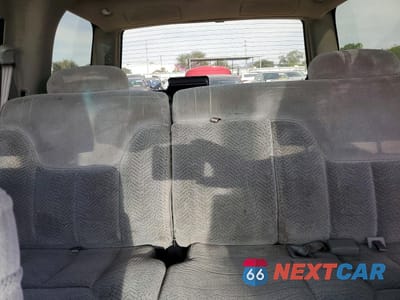 Zdjęcie 10 z 14 samochodu: 1999 CHEVROLET TAHOE C1500 VIN:1GNEC13R8XR118291 - miniatura