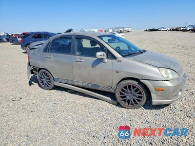 Czwarte zdjęcie samochodu z boku: 2004 SUZUKI AERIO S VIN:JS2RA61S345201414 - miniatura