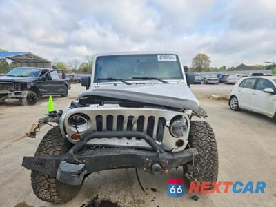 Piąte zdjęcie samochodu w środku: 2007 JEEP WRANGLER UNLIMITED R VIN:1J4GA39117L120918 - miniatura