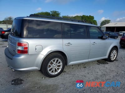 Trzecie zdjęcie samochodu z tyłu: 2016 FORD FLEX SE VIN:2FMGK5B83GBA06632 - miniatura