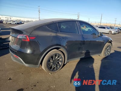 Trzecie zdjęcie samochodu z tyłu: 2023 TESLA MODEL Y VIN:7SAYGDEE4PA029765 - miniatura